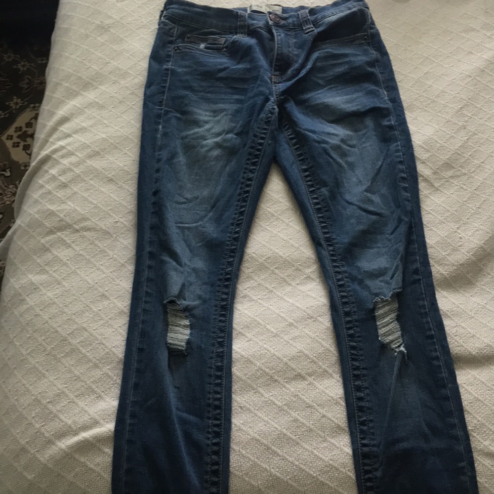 Mid rise distressed skinny jeans